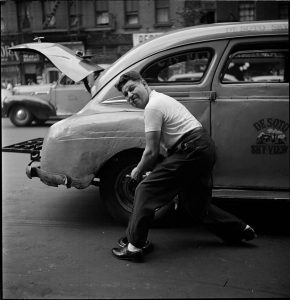 Changing the Tire, Photograph by Stanley Kubrick for Look Magazine
